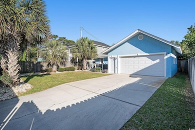Single story home with an attached garage, stucco 