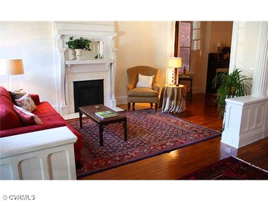 Living Room - The living room is flanked by half c