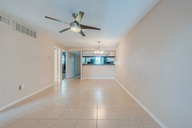LIVING/DINING COMBO WITH BREAKFAST BAR AND KITCHEN