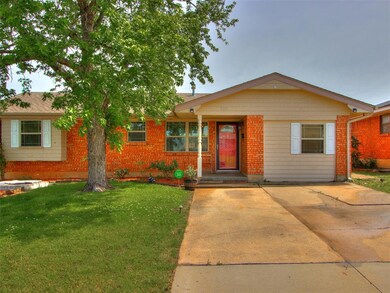 Ranch-style home with a front yard
