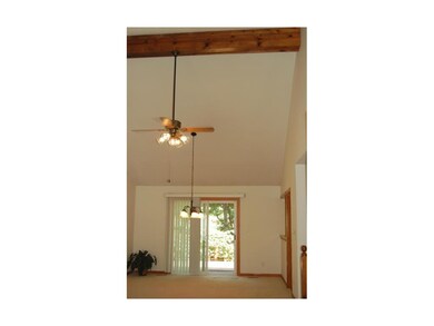Large dining area and slider leading out to the de