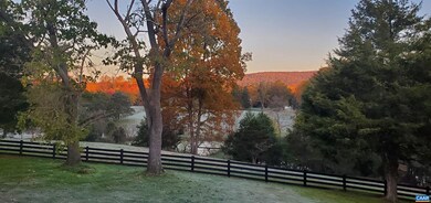 Front view in the fall with the southwest mountains in the distance.