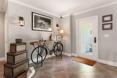 Bright entryway with plenty of light through the glass panel door