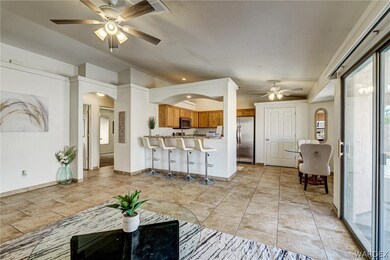 Living room featuring light tile patterned floors