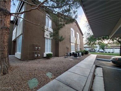 View of side of home with stucco siding and centra