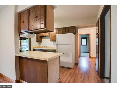 Freshly painted walls, & natural woodwork is seen 
