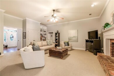 DEN WITH BUILT IN BOOK CASES AND GAS FIREPLACE