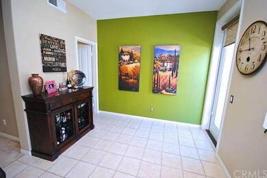 Large Breakfast Nook and French Door Leading to Ba