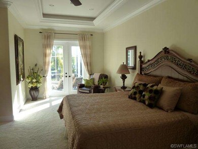 Master Bedroom and sitting area with french doors 