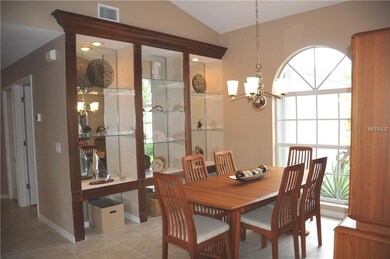 Formal Dining Room with built in lighted glass shelving