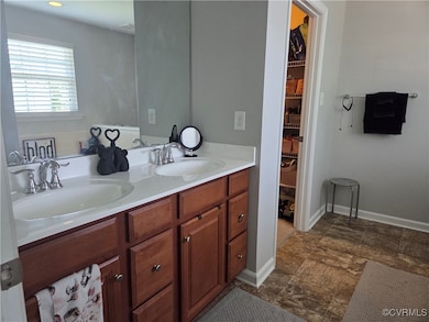 Full bathroom with double vanity