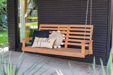 While away on the front porch swing.  The property