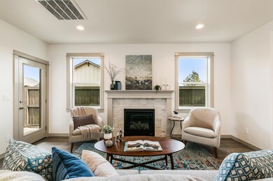 Harrison Living Room with Unlit Fireplac