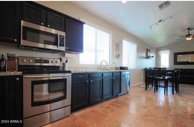 Spacious Kitchen w/ Espresso Cabinets