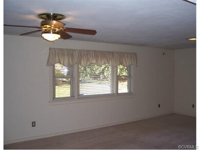 Family Room w/ Brick Fireplace