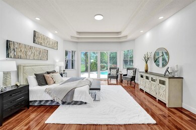 Sumptuous primary suite with solid hardwood floori