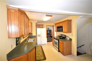 Bright kitchen with full appliances.