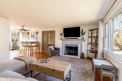Living room opens to dining area