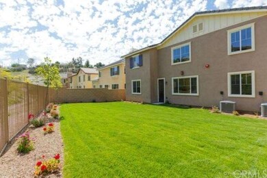 Large landscaped & fully fenced rear yard