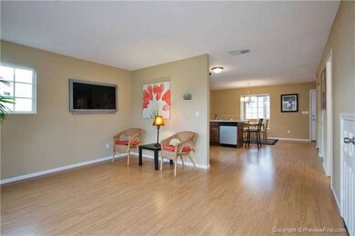 The Living Room Opens Up To The Kitchen Which Open