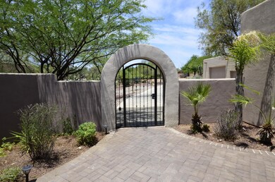 FENCED BRICK FRONT COURTYARD