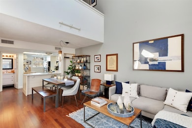 Living room featuring wood-type flooring and visi