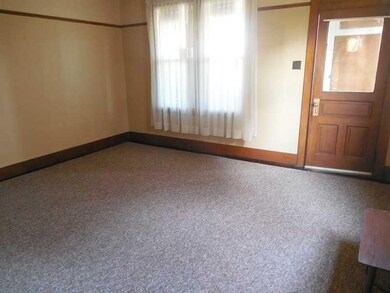 Living Room. This vestibule opens to a spacious li