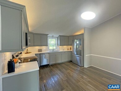 Gray Shaker Cabinets, Stainless Appliances, Solid 