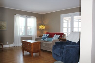 Natural light & hardwood floors in living room