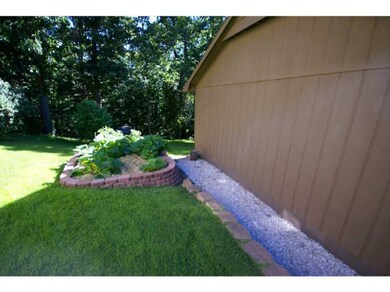 Exterior Back/Side. raised planting beds