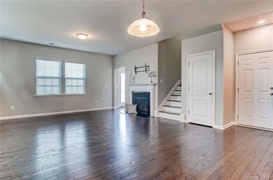 Great Room with Hidden Wood Stairway