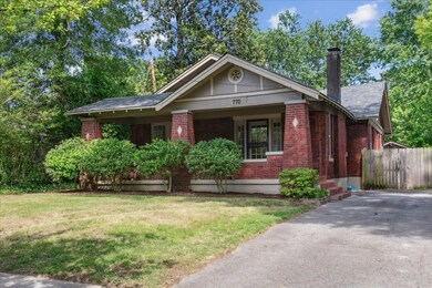 View of front of home featuring a front yard and a