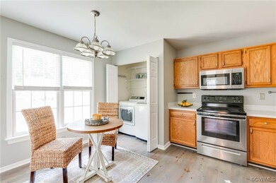 Kitchen featuring light hardwood flooring, pendant