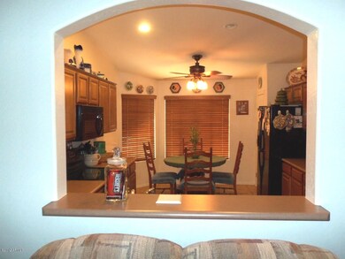LOOKING IN TO KITCHEN FROM GREAT RM
