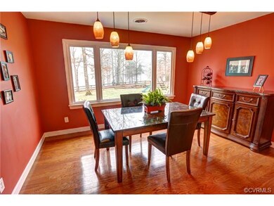 Formal dining room has large, picture window with 