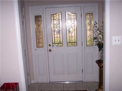 Interior entryway leading to Open and Inviting Gre