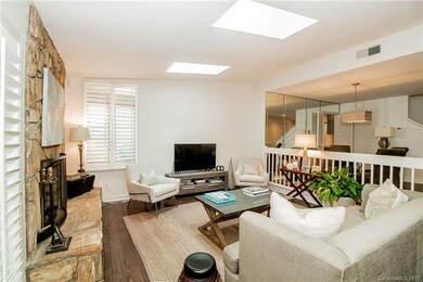 Gleaming sunlight pours in through three skylights