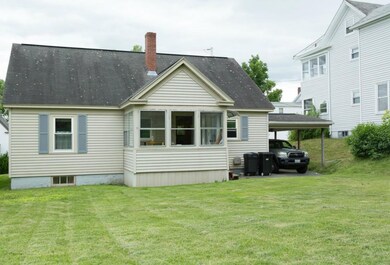 Level back yard with sun porch entry...
