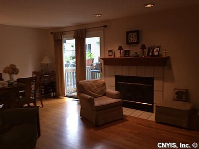 Living Room. Gas fireplace and slider heading out to deck.
