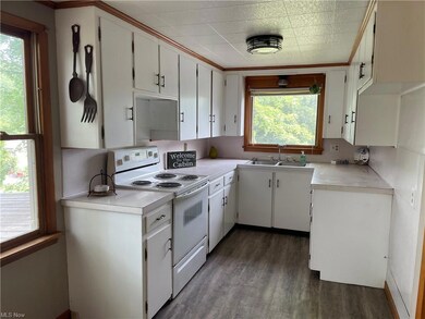 Eat in Kitchen with large picture window allows pl