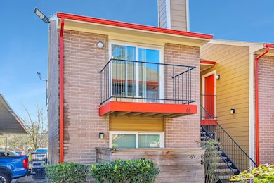 Upstairs unit #66 with a balcony.