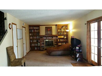 Family Room. Built in bookshelves.