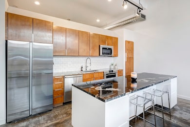 Alternate view of the sleek and modern kitchen fea