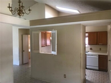 Dining area with pass thru window to kitchen