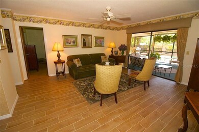 LIVING ROOM WITH ALL NEW WOOD PLANK TILE  FLOORING