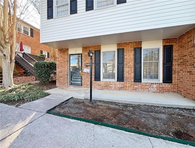 Doorway to property with a patio