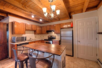 Kitchen with all Stainless Steel Appliances.