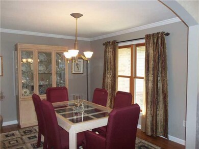 Dining Room. Hardwood Dining Room With Columns & C