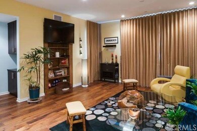 Living Room with Harwood Floors, Custom Built-in, 