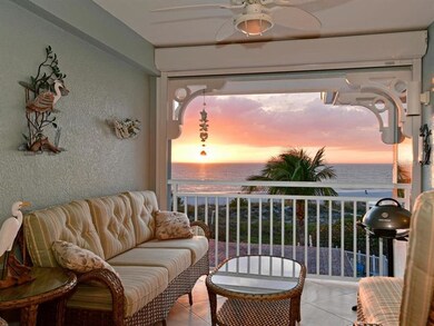 Covered balcony with motorized hurricane shutters 